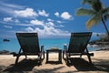 Tropical Beach Paradise. Palm Trees, Sun Loungers, and Table by the Serene Shoreline Royalty Free Stock Photo