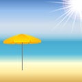 Beach with parasol and sun