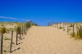 Beach Path Through Dunes with fence access sea in Lacanau ocean atlantic in France Royalty Free Stock Photo