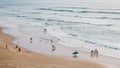 Beach with people swimming and surfing, Portugal, Algarve, Praia do Cordoama Royalty Free Stock Photo