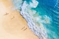 Beach, people and waves. Coast as a background from top view. Blue water background from drone. Summer seascape from air. Nusa Pen