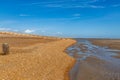 The beach at Pett Level on the Sussex coast, with a blue sky overhead