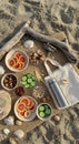 Beach Picnic with Citrus Fruit, Cucumbers and Nuts Royalty Free Stock Photo