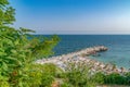 A beach and a pier in Nessebar ancient city, one of the major seaside resorts on the Bulgarian Black Sea Coast. Nesebar, Nesebr is