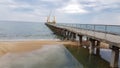 Beach pier sand sea Royalty Free Stock Photo