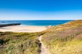 Beach Pit on Breton coastline in France Frehel Cape region with its sand, rocks and moorland in summer