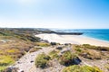 Beach Pit on Breton coastline in France Frehel Cape region with its sand, rocks and moorland in summer