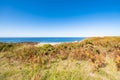 Beach Pit on Breton coastline in France Frehel Cape region with its sand, rocks and moorland in summer