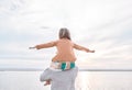 The beach is a place where everyone can just let loose. a man spending and his daughter spending time together at the Royalty Free Stock Photo