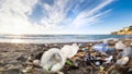 Beach with plastic waste brought by the sea