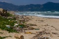 Beach pollution, plastic and waste from ocean on the beach