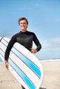 Beach, portrait and happy man with surfboard for fitness exercise workout or body health in summer outdoor. Surfer