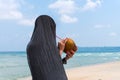 beach profile girl drinking a coconut fresh cocktail in tropical sea