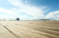 Beach promenade with benches and blue sky Royalty Free Stock Photo