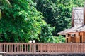 Beach resort with nipa hut cottages and forest Royalty Free Stock Photo