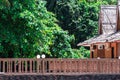 Beach resort with nipa hut cottages and forest Royalty Free Stock Photo