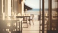 Beach restaurant with sea view. Blurred background. Toned. Royalty Free Stock Photo