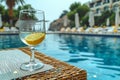 Beach retreat wicker table, empty wine glass with lemon inside