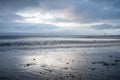 The beach of Rivedoux with the Chauveau lighthouse in the sea off the island of RÃÂ©. It is one of the most famous lighthouses near Royalty Free Stock Photo