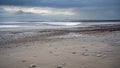 The beach of Rivedoux with the Chauveau lighthouse in the sea off the island of Re Royalty Free Stock Photo