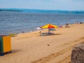 Beach on the river with a minimum number of people or empty