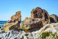 Beach rock formation, solitary boulder stones made of granite