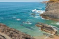 Beach with rocks in Praia do Cavaleiro in Alentejo, Portugal