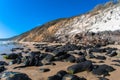 Beach Rocks Sand Hillside Contrasts Royalty Free Stock Photo