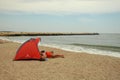 Beach in Romania, Black sea in Constanta city with a red tent