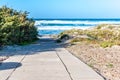 Beach with rough sea in a sunny day Royalty Free Stock Photo