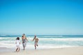 Beach, running and happy family with child with tropical sea, island holiday or travel vacation blue sky mock up Royalty Free Stock Photo