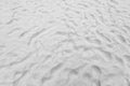 Beach sand background with footprints Royalty Free Stock Photo