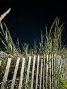 Beach sand dune fence at night Royalty Free Stock Photo