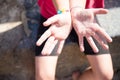 Sand gets sticky on skin hands after playing with it Royalty Free Stock Photo