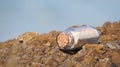 Beach sand in glass bottle, standing on beach rock. Mana island, Fiji Royalty Free Stock Photo