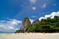 Beach sand mountain blue sky cloudy