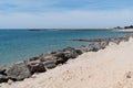 Beach sand with rocks in island of Noirmoutier in Vendee France Royalty Free Stock Photo