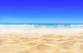 Beach sand texture and blue sky background Royalty Free Stock Photo
