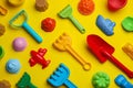 Beach sand toys on yellow background, flat lay Royalty Free Stock Photo