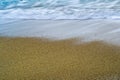 Beach sand and waves