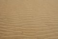 Beach sand waves warm texture background Royalty Free Stock Photo