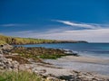 From the beach at Sandwick the picturesque coast of No Ness stretches into the distance.