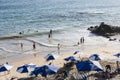 Beach scene on a busy spring day with people at leisure