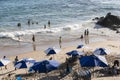 Beach scene on a busy spring day with people at leisure