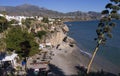 Beach Scene in Nerja, a sleepy Spanish Holiday resort on the Costa Del Sol near Malaga, Andalucia, Spain, Europe Royalty Free Stock Photo