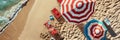 A beach scene with a row of umbrellas and chairs