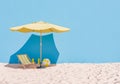 Beach Scene with Umbrella, Chair, and Beach Ball, Summer Leisure Concept Royalty Free Stock Photo