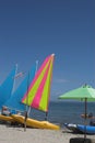 Beach scene with yachts and canoe Royalty Free Stock Photo