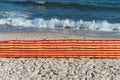 Beach screen on the Polish beach on a sunny summer day in the background a rough sea. Royalty Free Stock Photo