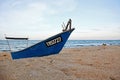 Beautiful sunset beach with fisherman boat